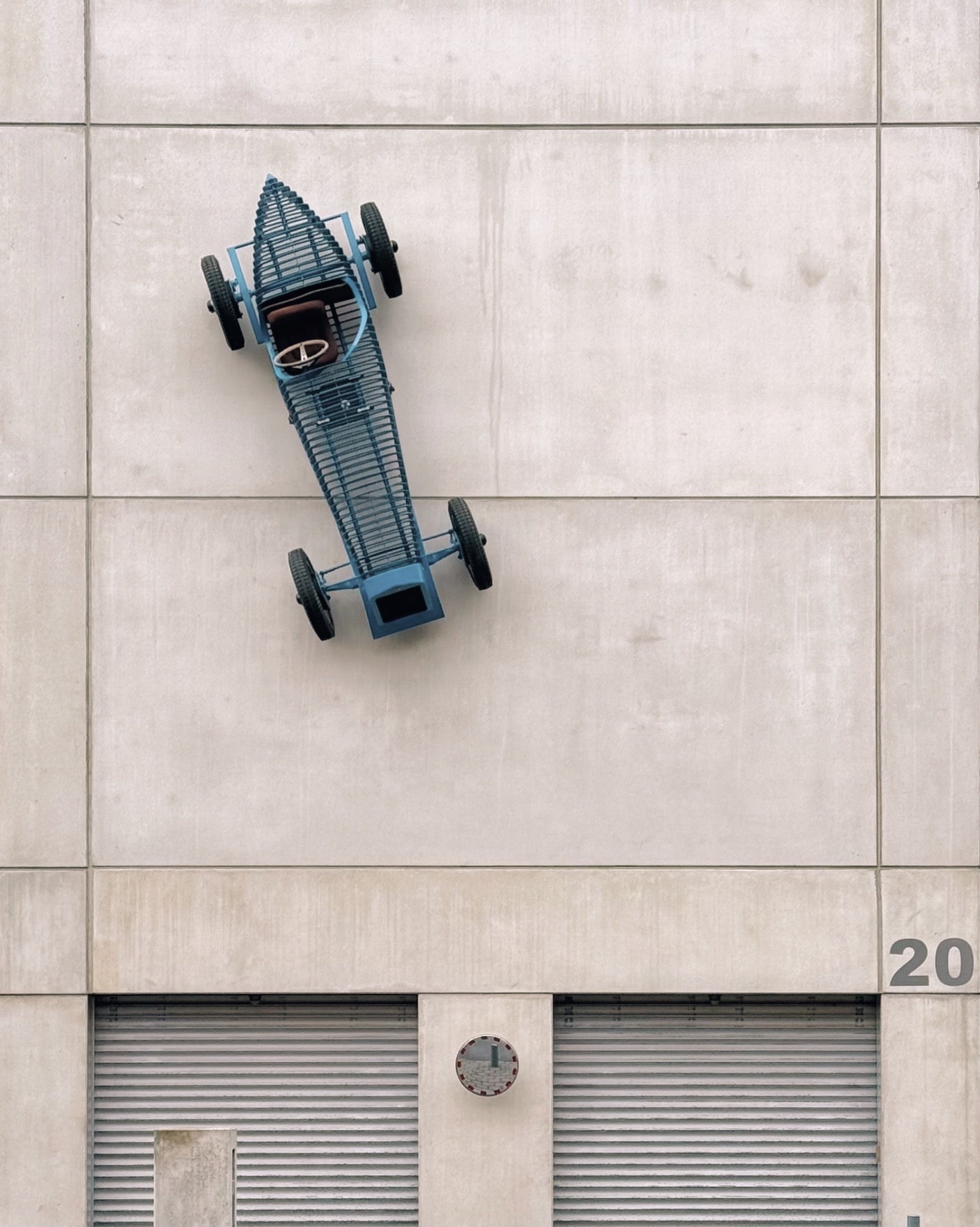 Car on the wall,
East Garage